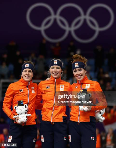 Silver medalist Ireen Wust of the Netherlands, gold medalist Carlijn Achtereekte of the Netherlands and bronze medalist Antoinette De Jong of the...