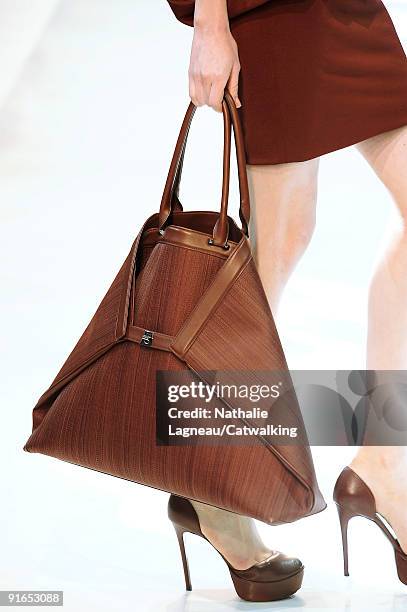 Model walks the runway during the Akris Ready To Wear show as part of the Paris Womenswear Fashion Week Spring/Summer 2010 on October 4, 2009 in...