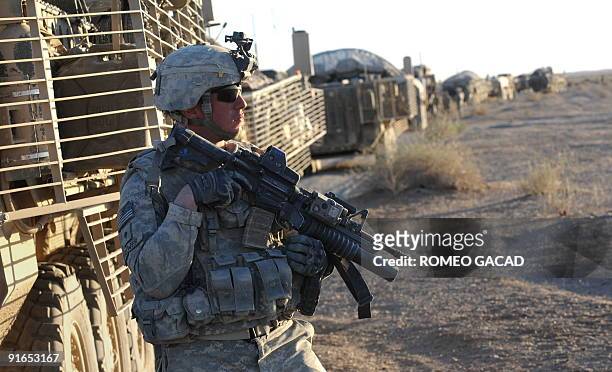 Army Specialist Daniel Brewer from the 3rd Platoon, Charlie Company, 1st Infantry Regiment, 5th Stryker Brigade Combat Team, 2nd Infantry Division...