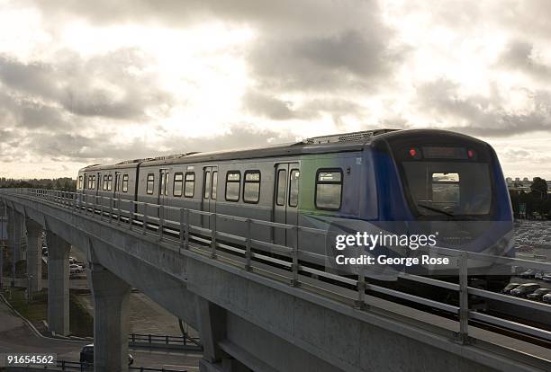 SkyTrain light rail rapid transit train arrives at the Vancouver Airport Terminal as seen in this 2009 Vancouver, British Columbia, Canada, cityscape...