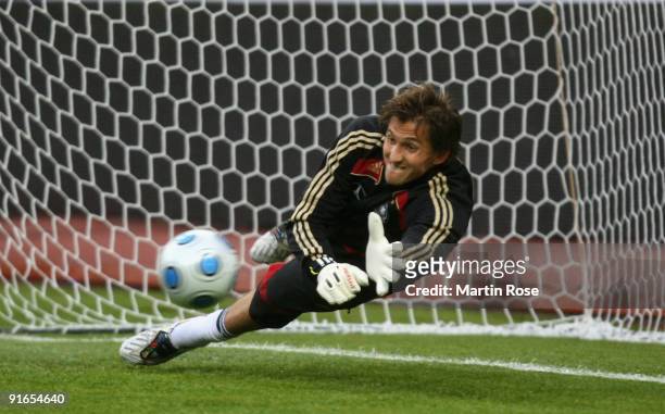 Goalkeeper Rene Adler saves the ball during the German National Team training session at the Luzhniki stadium on October 9, 2009 in Moscow, Russia.