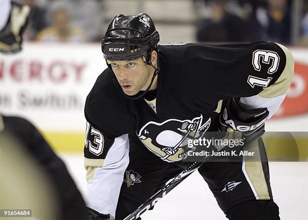 Bill Guerin of the Pittsburgh Penguins readies for a face off against the Phoenix Coyotes at Mellon Arena on October 07, 2009 in Pittsburgh,...