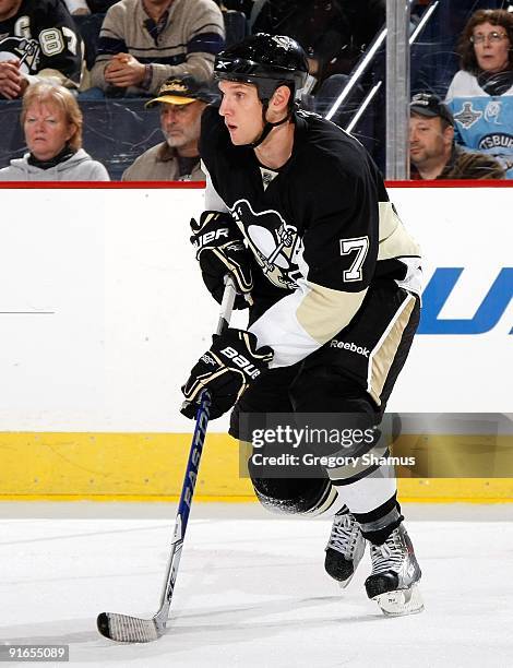 Mark Eaton of the Pittsburgh Penguins looks to pass against the Phoenix Coyotes on October 7, 2009 at Mellon Arena in Pittsburgh, Pennsylvania.