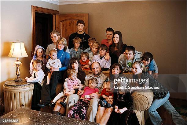 Family portrait of a polygamist family consisting of one father, three mothers and 21 children. This plural family lives in the Salt Lake Valley...