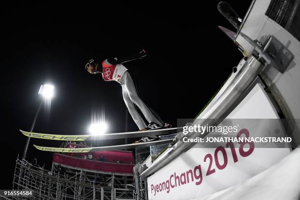 Germany's Markus Eisenbichler competes in the men's normal hill individual ski jumping event during the Pyeongchang 2018 Winter Olympic Games on...