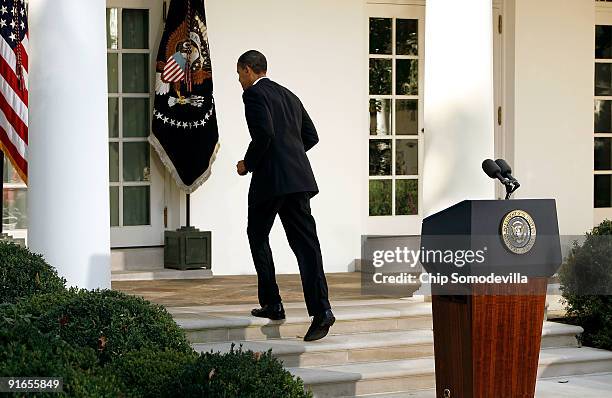 President Barack Obama turns to leave after delivering remarks about winning the 2009 Nobel Peace Prize in the Rose Garden at the White House October...