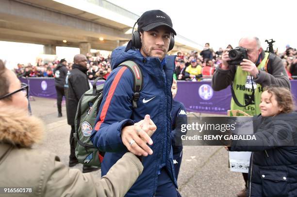 Young fans greet Paris Saint-Germain's Brazilian forward Neymar Jr upon his arrival at the Municipal stadium for the French L1 football match between...