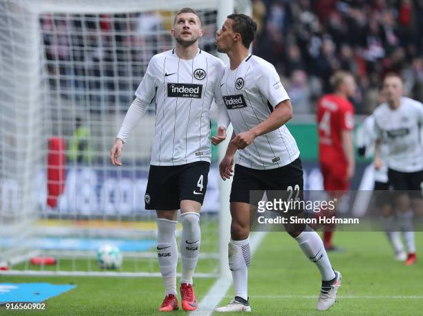 Ante Rebic of Frankfurt celebrates after he scored a goal to make it 1:0, with Timothy Chandler of Frankfurt , during the Bundesliga match between...