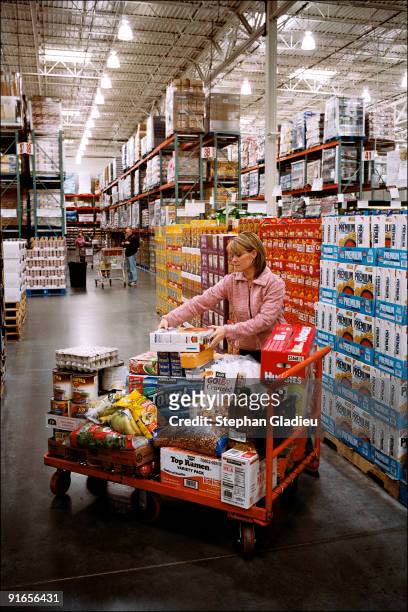 Valerie, one of three wives in a polygamist family from the Salt Lake Valley, shops at Costco once a week and spends an average of USD $400 to feed...