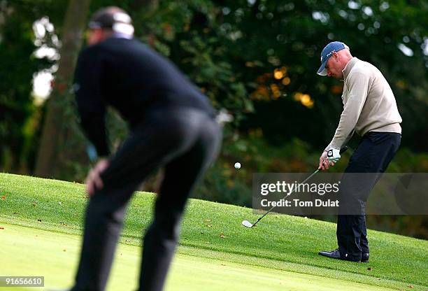 Aron Wainwright of Oulton Ha chips onto the 5th green during the SkyCaddie PGA Fourball Championship at Forest Pines Golf Club on October 09, 2009 in...