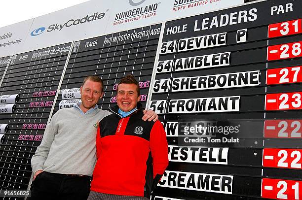 Patrick Devine of Royal Dublin and Stuart Taylor of Island pose for photos after winning the SkyCaddie PGA Fourball Championship at Forest Pines Golf...