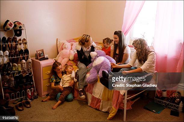 Children from a polygamist family living in the Salt Lake Valley consisting of one husband, three wives and 21 children. Expected to be role models...