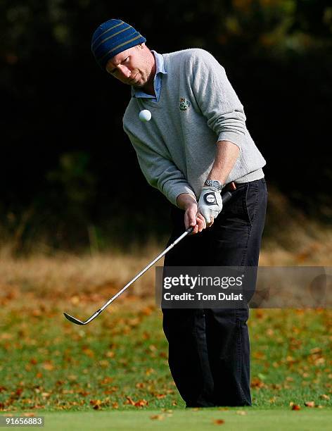 Paddy Devine of Royal Dublin chips onto the green during the SkyCaddie PGA Fourball Championship at Forest Pines Golf Club on October 09, 2009 in...