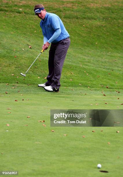 Stuart Taylor of Island goes for birdie on 5th hole during the SkyCaddie PGA Fourball Championship at Forest Pines Golf Club on October 09, 2009 in...