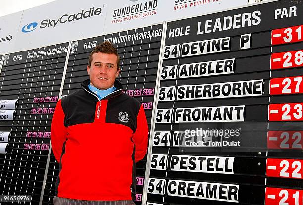 Stuart Taylor of Island poses for photos after winning the SkyCaddie PGA Fourball Championship at Forest Pines Golf Club on October 09, 2009 in...