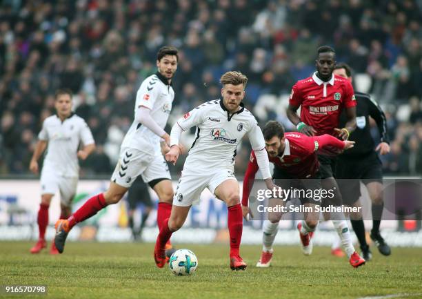 Lucas Hoeler of SC Freiburg fights for the ball during the Bundesliga match between Hannover 96 and Sport-Club Freiburg at HDI-Arena on February 10,...