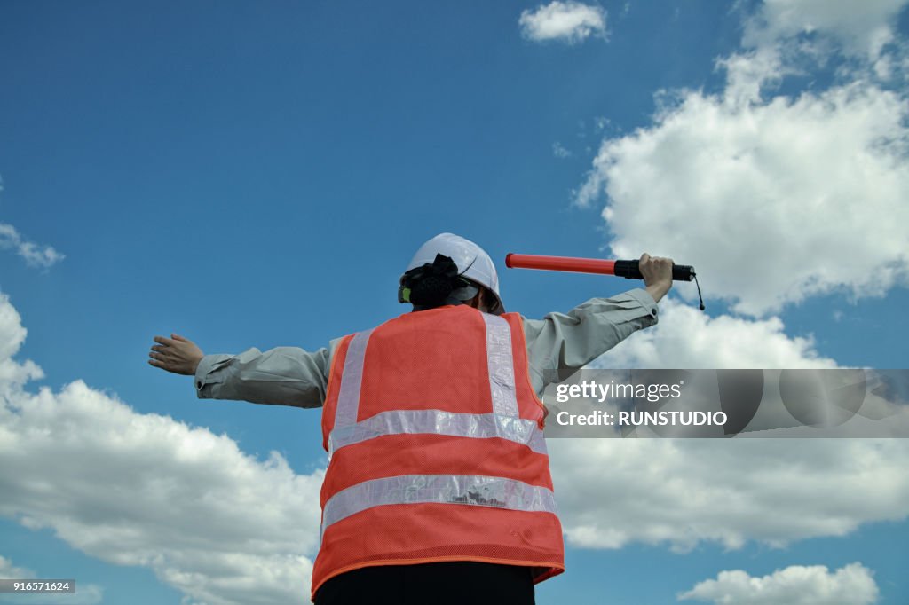 Traffic guard holding traffic rod