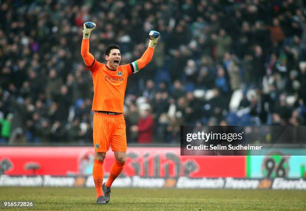 Goalkeeper Philipp Tschauner of Hannover 96 celebrates his team's first goal scoring during the Bundesliga match between Hannover 96 and Sport-Club...