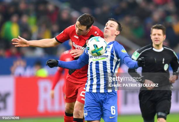 Leverkusen's German midfielder Dominik Kohr and Berlin's Czech midfielder Vladimir Darida vie for the ball during the German first division...