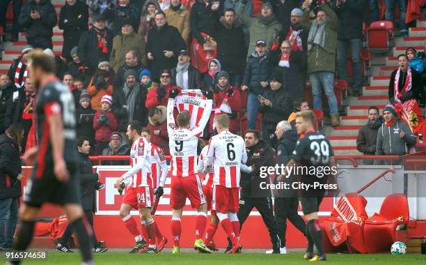 Steven Skrzybski,Sebastian Polter, Kristian Pedersen, assistant coach Sebastian Boenig and coach Andre Hofschneider of 1 FC Union Berlin celebrate...