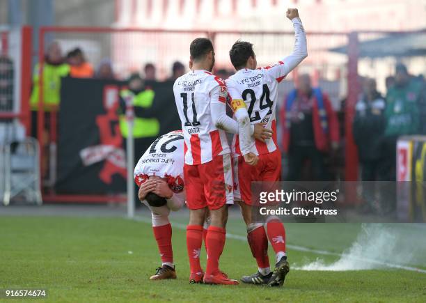 Grischa Proemel, Akaki Gogia and Steven Skrzybski of 1 FC Union Berlin celebrate after scoring the 3:1 during the second Bundesliga game between...