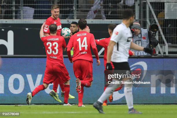 Simon Terodde of Koeln celebrates after he scored a penalty goal to make it 1:1 during the Bundesliga match between Eintracht Frankfurt and 1. FC...