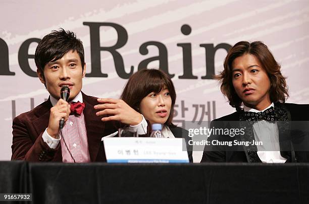 Actor Lee Byung-Hun and Takuya Kimura attend at the Press Conference-Gala Presentation 'I Come with the Rain' during the 14th Pusan International...