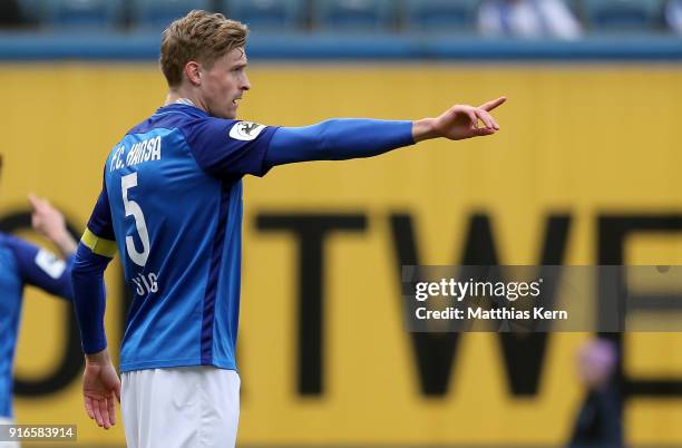 Oliver Huesing of Rostock gestures during the 3. Liga match between F.C. Hansa Rostock and FC Wuerzburger Kickers at Ostseestadion on February 10,...