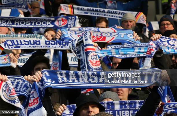 Supporters of Rostock celebrate their team during the 3. Liga match between F.C. Hansa Rostock and FC Wuerzburger Kickers at Ostseestadion on...