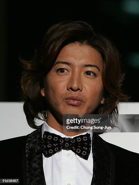 Actor Takuya Kimura attends at the photocall for the Gala Presentation 'I Come with the Rain' during the 14th Pusan International Film Festival at...
