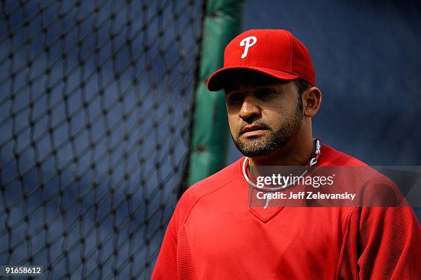 Miguel Cairo of the Philadelphia Phillies looks on during batting practice prior to Game One of the NLDS against the Colorado Rockies during the 2009...