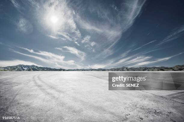 empty parking lot - empty road mountains stock pictures, royalty-free photos & images