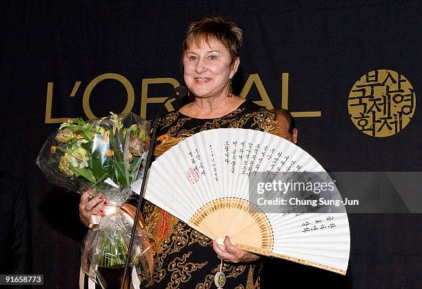 Director Jeannette Paulson Hereniko speaks after receiving the Korean Cinema award during the 14th Pusan International Film Festival on October 9,...