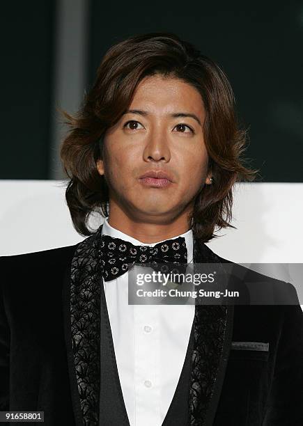 Actor Takuya Kimura attends the photocall for the Gala Presentation 'I Come with the Rain' during the 14th Pusan International Film Festival at the...