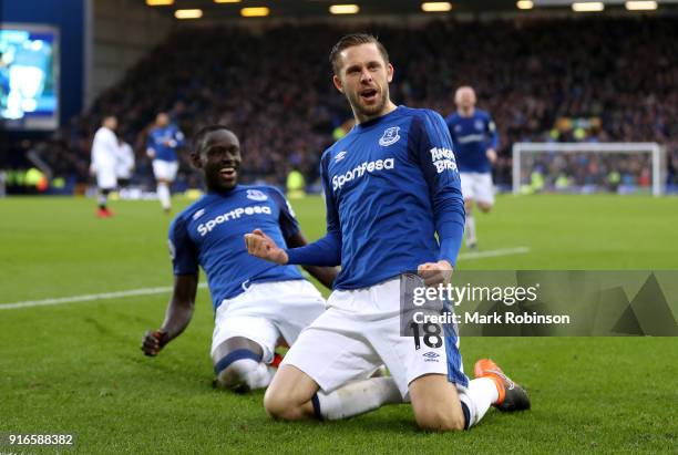 Gylfi Sigurdsson of Everton celebrates with teammate Oumar Niasse after scoring his sides first goal during the Premier League match between Everton...