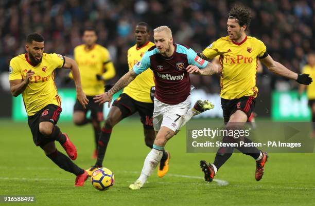 Watford's Gerard Deulofeu battles for the ball during the Premier League match at London Stadium.