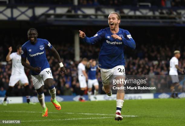 Tom Davies of Everton celebrates after scoring his sides third goal during the Premier League match between Everton and Crystal Palace at Goodison...