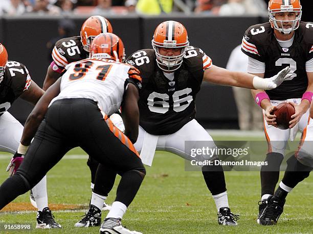 Offensive lineman Hank Fraley of the Cleveland Browns prepares to block defensive lineman Robert Geathers of the Cincinnati Bengals during a game on...