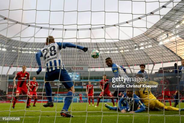 Fabian Lustenberger of Berlin saves a free-kick of Karim Bellarabi of Leverkusen during the Bundesliga match between Bayer 04 Leverkusen and Hertha...