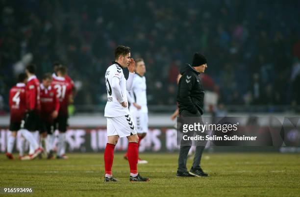 Christian Guenter and headcoach Christian Streich of SC Freiburg look disappointed after the Bundesliga match between Hannover 96 and Sport-Club...