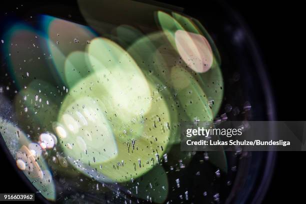 Water drops are seen on a lens of a tv camera of Sportcast prior to the Bundesliga match between Bayer 04 Leverkusen and Hertha BSC at BayArena on...
