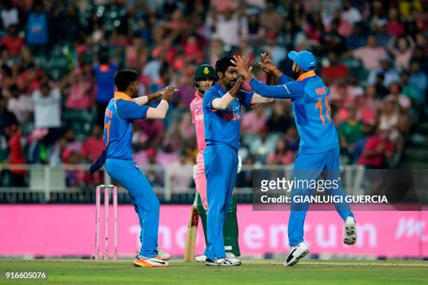 Indian bowler Jasprit Bumrah celebrates the dismissal of South African batsman and Captain Aiden Markram during the fourth One Day International...
