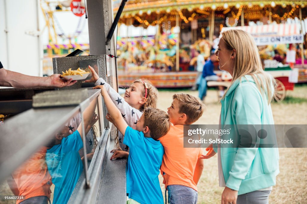 Family getting Food at the Fairground