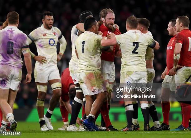 Alun Wyn Jones of Wales confronts Mako Vunipola of England and Dylan Hartley of England during the NatWest Six Nations round two match between...