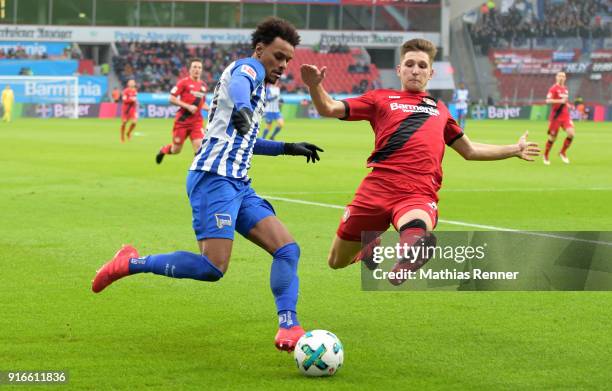 Valentino Lazaro of Hertha BSC and Panagiotis Retsos of Bayer 04 Leverkusen during the first Bundeliga game between Bayer 04 Leverkusen and Hertha...