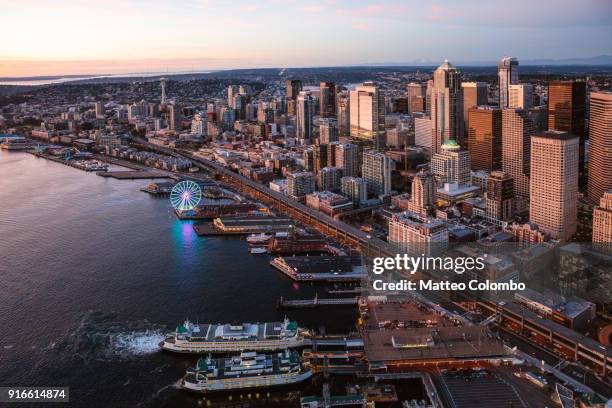 aerial view of seattle downtown and the great wheel at sunset, usa - seattle port stock pictures, royalty-free photos & images