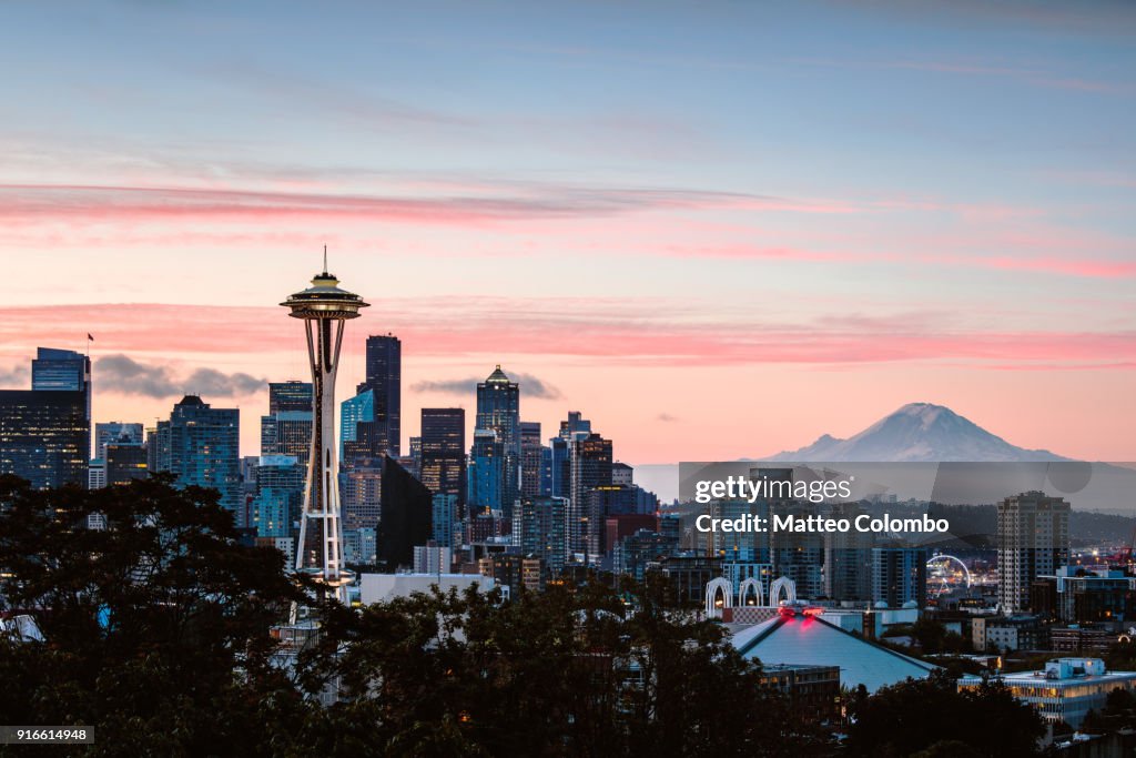 Skyline at dawn with Space Needle and Mt Rainier, Seattle, USA