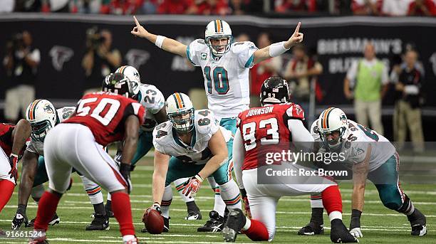 Chad Pennington of the Miami Dolphins signals at the line against the Atlanta Falcons at Georgia Dome on September 13, 2008 in Atlanta, Georgia. The...