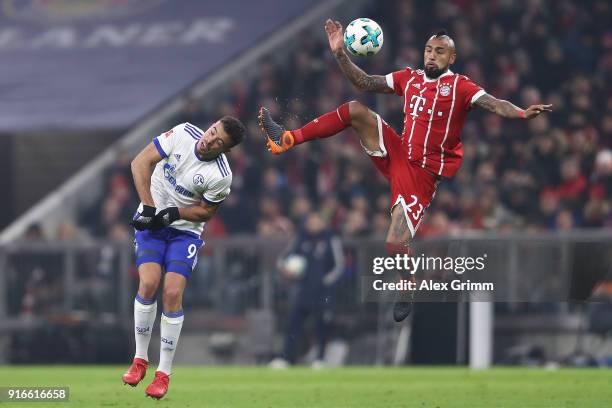 Arturo Vidal of Bayern Muenchen and Franco Di Santo of Schalke fight for the ball during the Bundesliga match between FC Bayern Muenchen and FC...