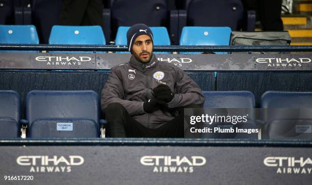 Riyad Mahrez of Leicester City sits on the bench during the Premier League match between Manchester City and Leicester City at Etihad Stadium, on...